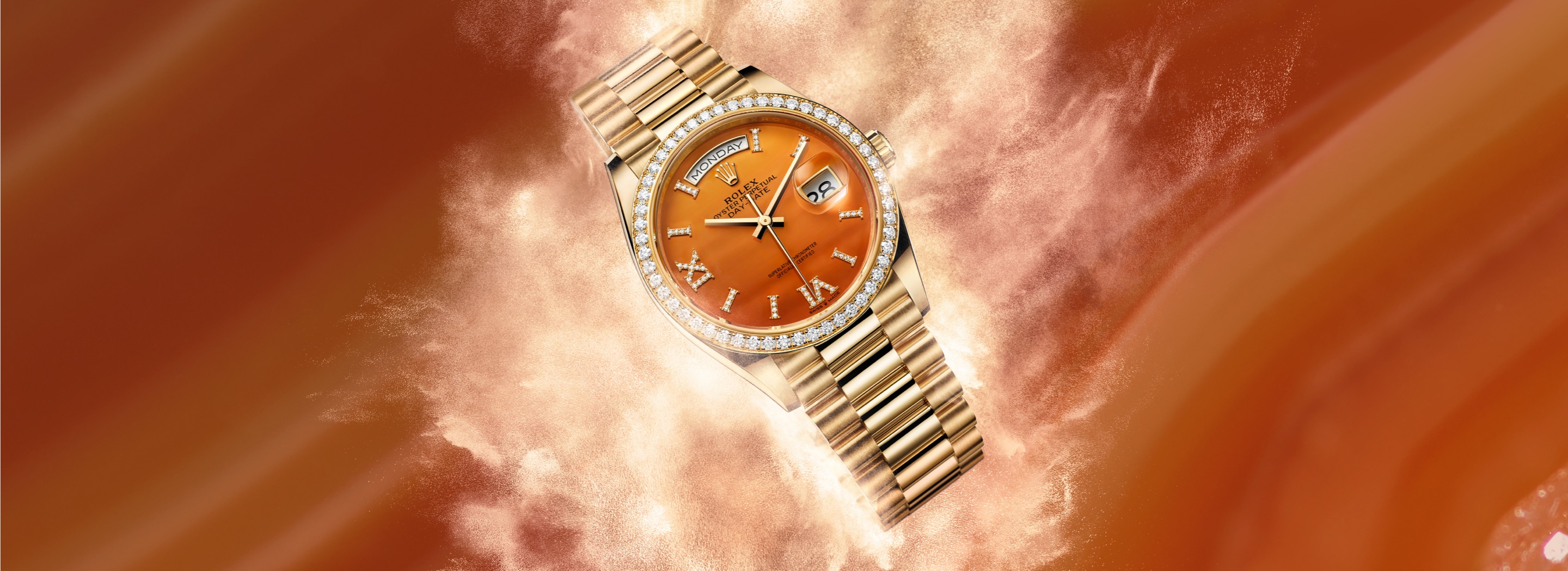 Rolex Day-Date — Ambiance Gelbgold mit Diamant-Lünette
