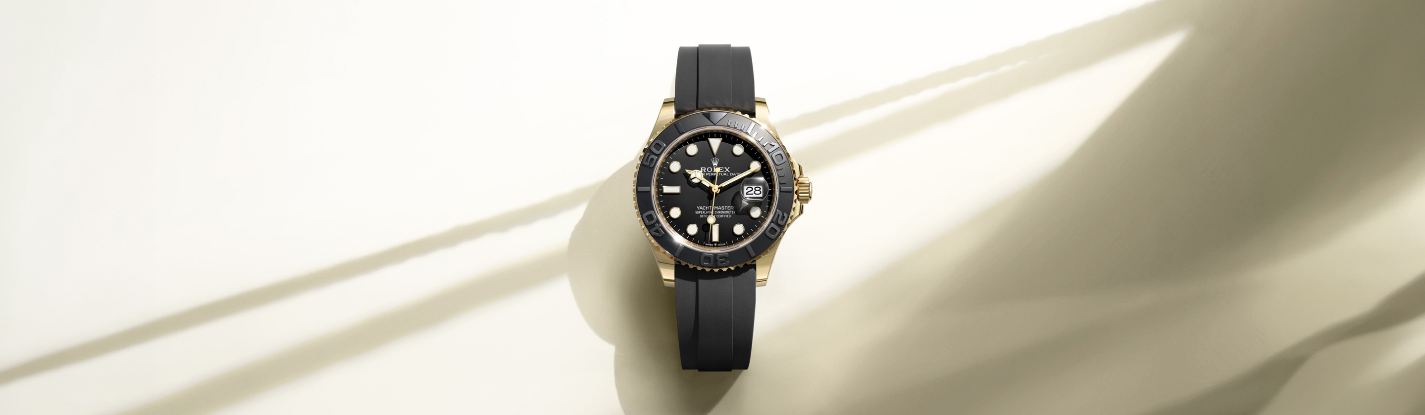 Rolex Yacht-Master 42 in 18 Karat Gelbgold mit schwarzem Oysterflex-Band