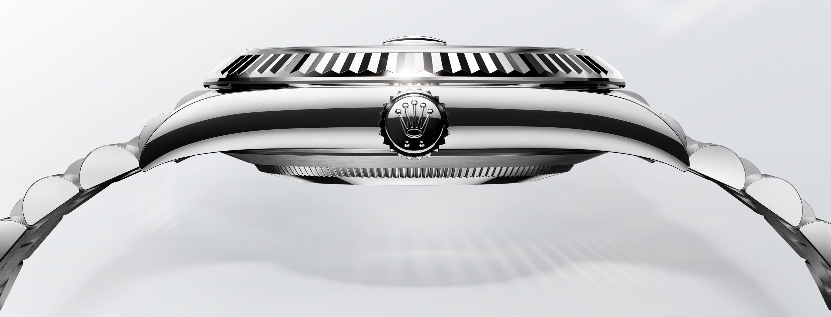 Rolex Oyster-Gehäuse — Seitenprofil mit Krone und geriffelter Lünette